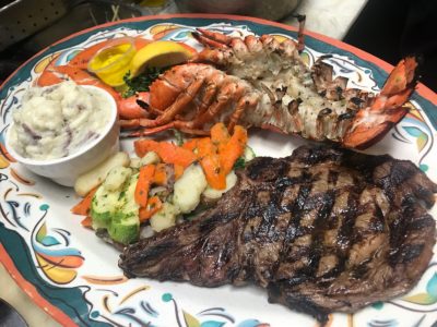 ribeye and garlicky grilled lobster